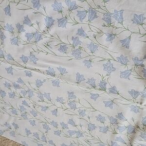Ikea blue and white floral curtains.  Pair with tiebacks.